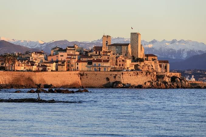 Old Antibes and its ramparts with the Alps behind