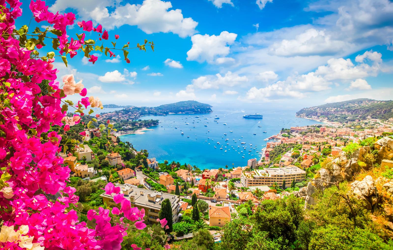 Bay of Villefranche-sur-Mer framed by bougainvillea